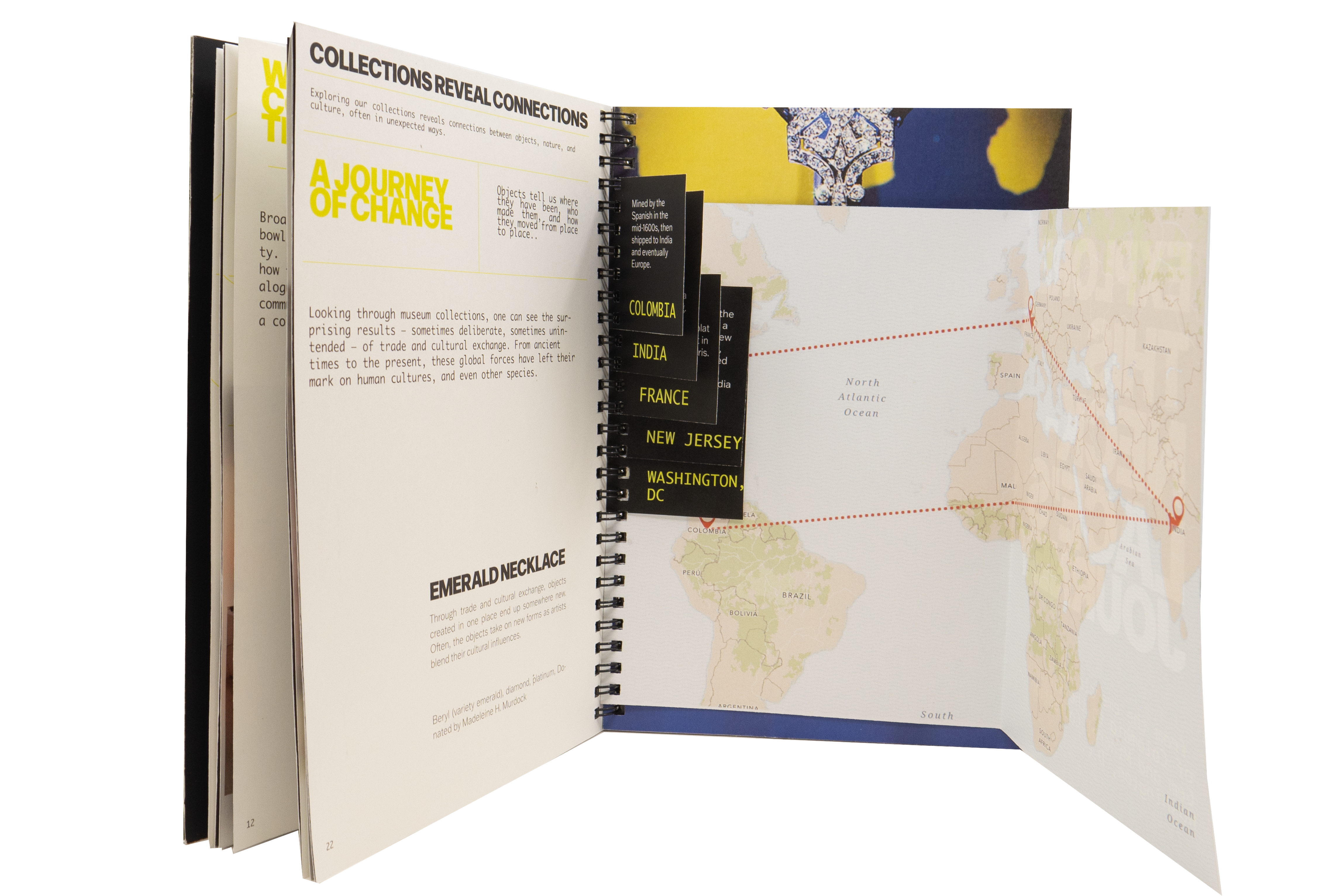 catalog standing up displaying a spread with a gate fold map